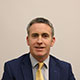Official photograph of Damien English