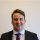 Official photograph of John McGahon