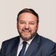 Official photograph of Pádraig Mac Lochlainn